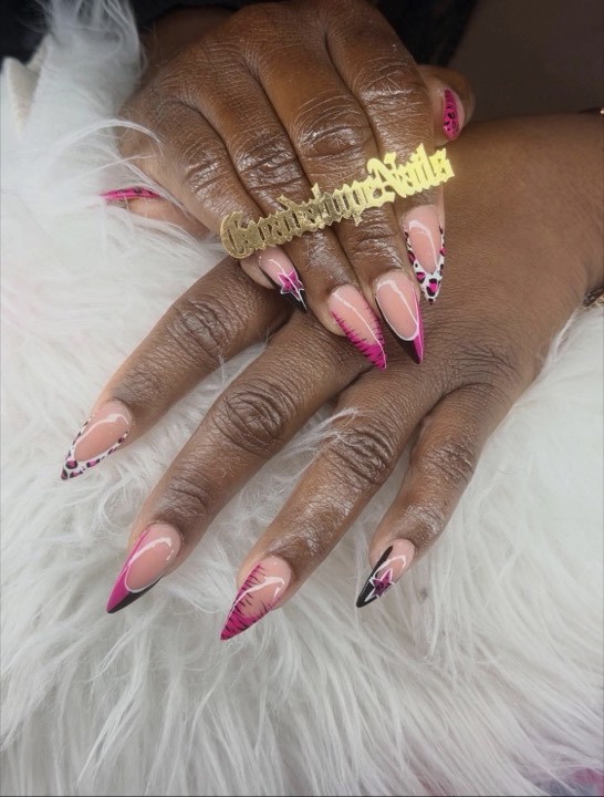 Almond nails with hot pink French tips and leopard accents