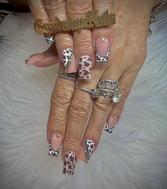 Square nails with brown leopard print and leopard French tips